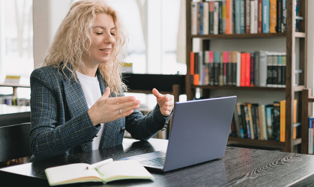 A financial advisor on a video call with their clients